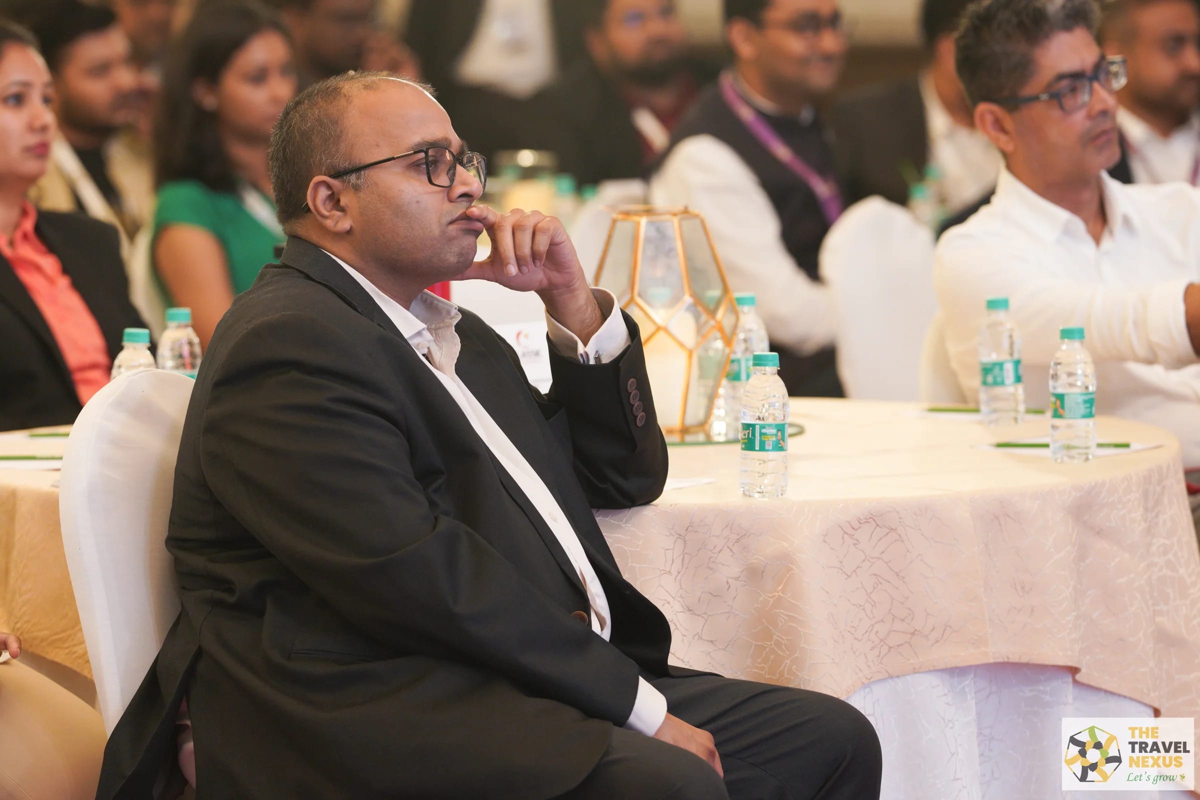 A delegate listening during the first Travel Nexus programme