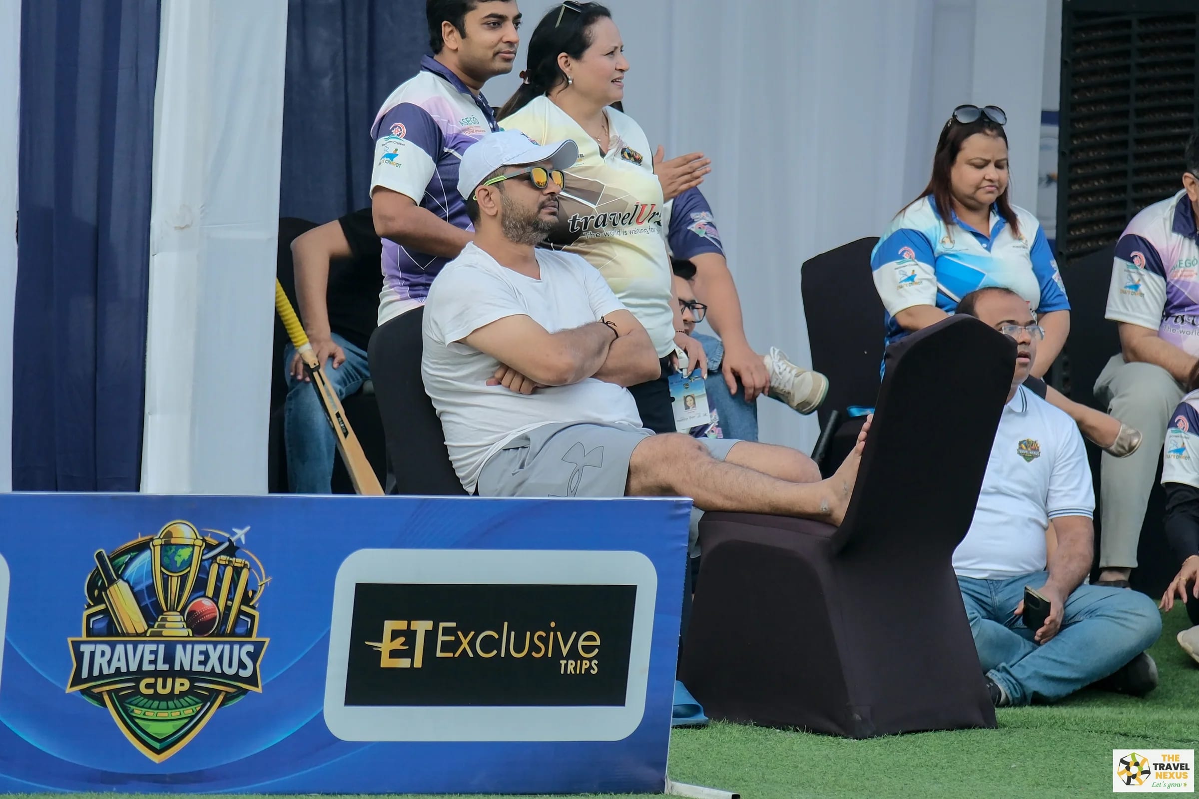 Travel Nexus Cup players together on the Ahmedabad field