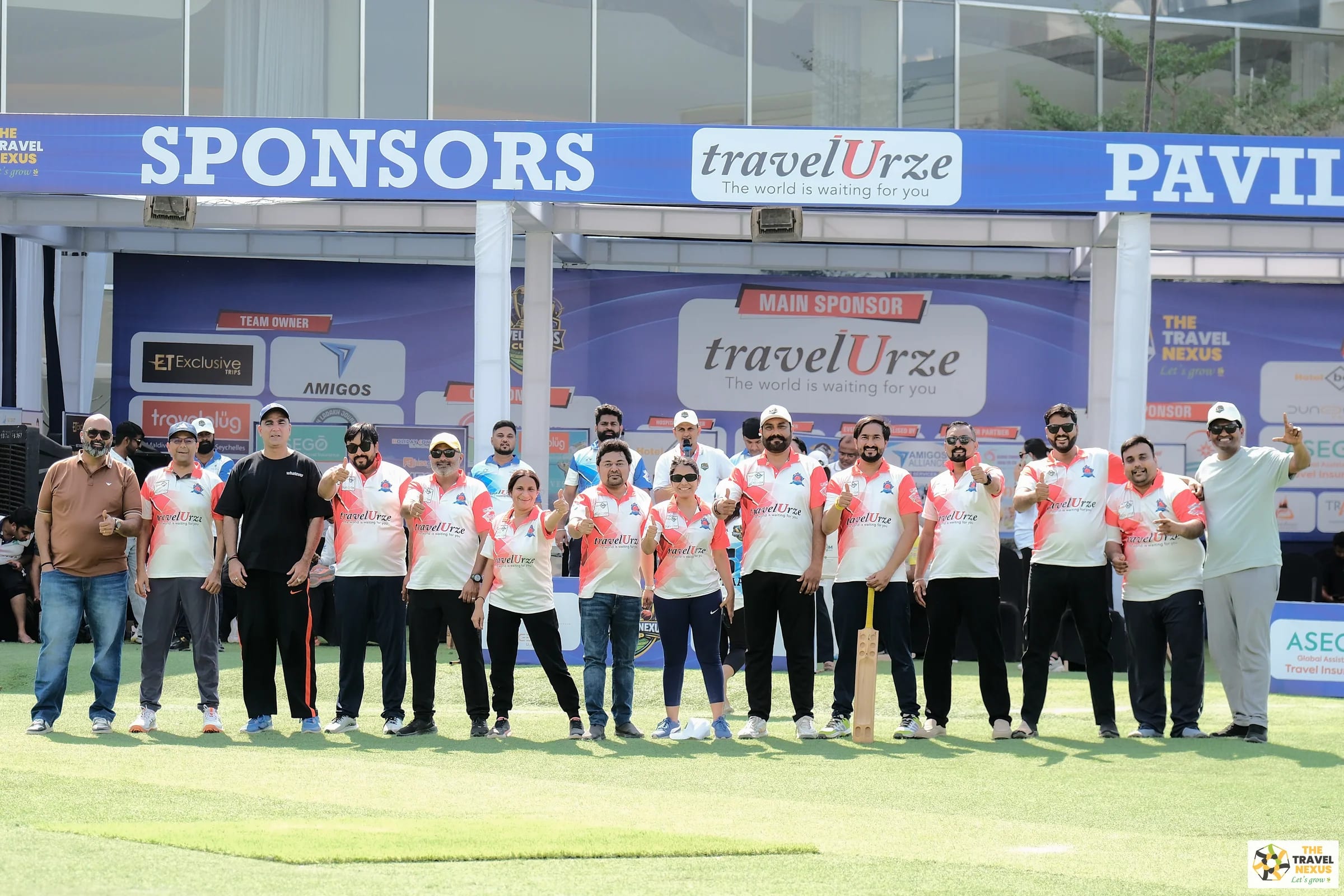 A Travel Nexus Cup team lined up beside the sponsor pavilion
